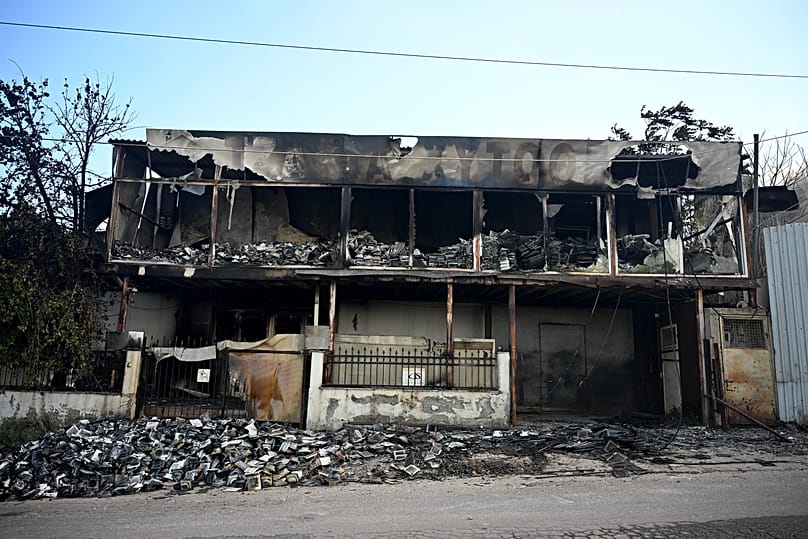 A view of a burnt building from a wildfire on the outskirts of the northern city of Thessaloniki, 5 July, 2026