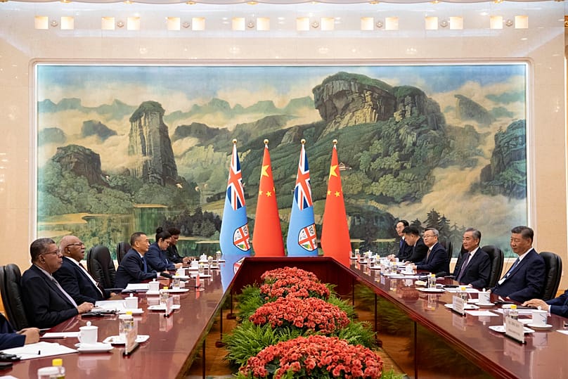 Fiji's Prime Minister Sitiveni Rabuka and Chinese President Xi Jinping attend a meeting at the Great Hall of the People in Beijing, 20 August, 2024