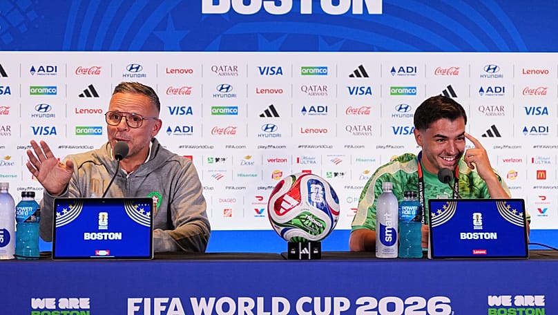 Morocco head coach Mohamed Ouahbi and forward Brahim Diaz (10) talk to the media ahead of the World Cup quarterfinal match against France near Boston, Wednesday, July 8, 2026