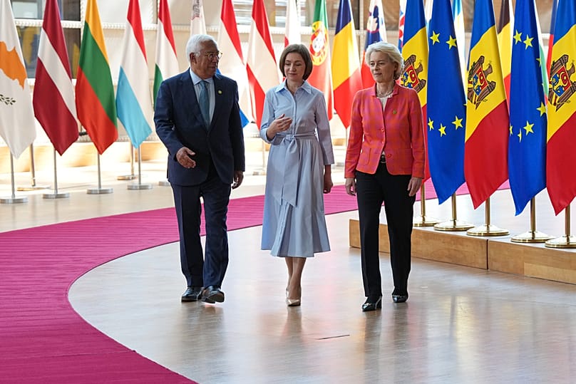 EU Council President Antonio Costa, Moldova's President Maia Sandu and EU Commission President Ursula von der Leyen arrive for the EU-Moldova summit in Brussels, June 22, 2026
