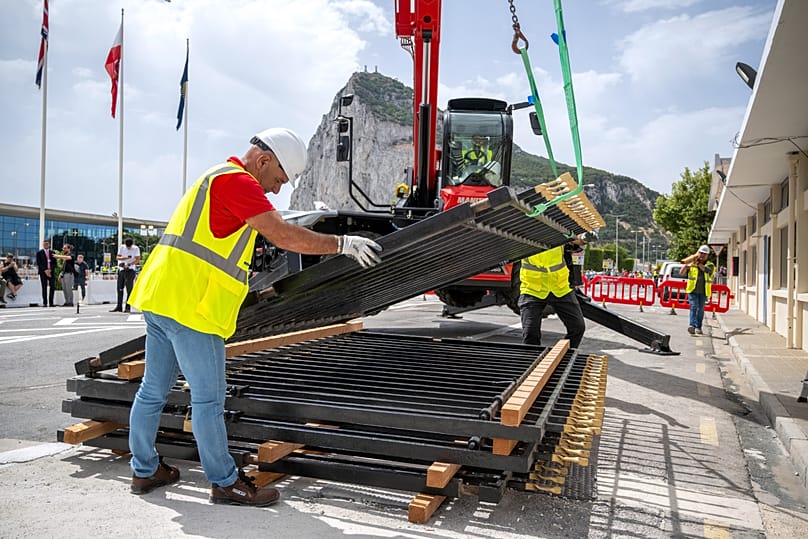 Workers remove the fence separating Gibraltar from Spain in La Línea de la Concepción, 15 July, 2026
