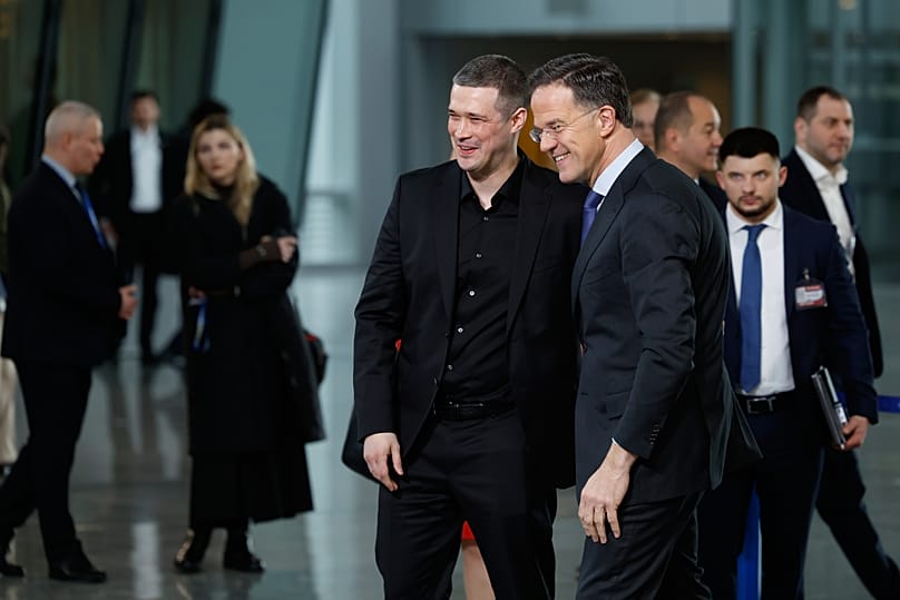 FILE: NATO Secretary General Mark Rutte greets Mykhailo Fedorov prior to addressing the media at NATO headquarters Feb. 12, 2026. 