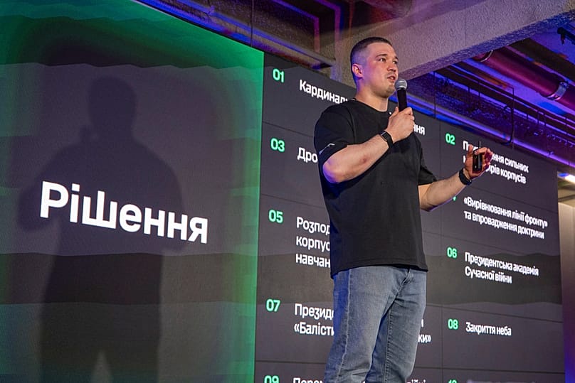 Outgoing Ukraine's Defense Minister Mykhailo Fedorov speaks during a briefing to journalists in Kyiv, Ukraine, Thursday, July 16, 2026. The sign on left reads 