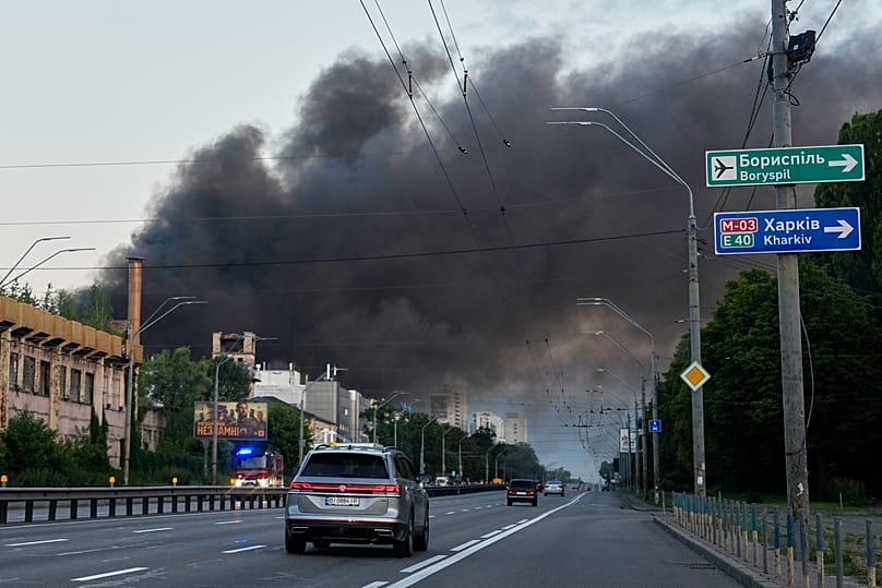 Smoke fills the sky over Kyiv after a Russian strikes cause large fires in residential areas