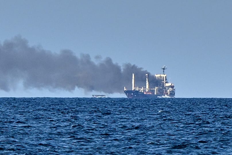 Smoke rises from the grain carrier Golden Leo under the Guinea-Bissau flag after Russian missile strike in the Black Sea close to Odesa, 19 July, 2026