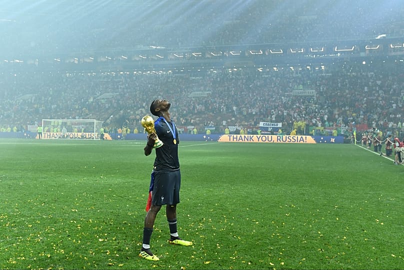 The whole world in his hands: Paul Pogba celebrates with the World Cup Trophy after France beat Croatia in the final at Moscow's Luzhniki Stadium, 15 July 2018