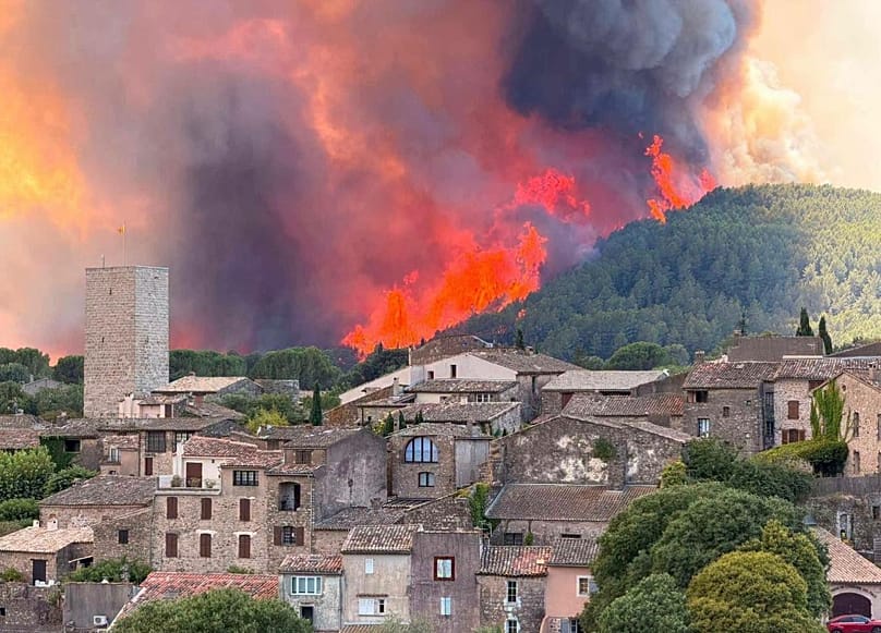 Wildfire nearing the village of Les Arcs, in France, 21 July 2026