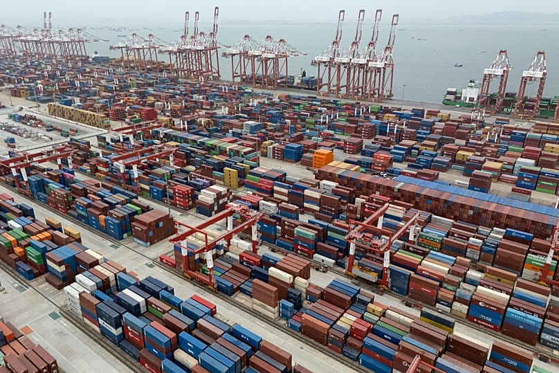 FILE - Shipping containers are seen ready for transport at the Guangzhou Port in the Nansha district in southern China's Guangdong province, April 17, 2025.