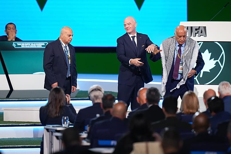 Palestinian Football Association President Jibril Rajoub walks away from Gianni Infantino - 30 April 2026