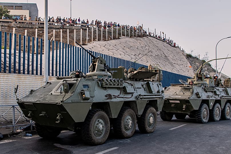 Soldiers from the Spanish army travel in military vehicles after being deployed in the Spanish enclave of Ceuta, Thursday 30 July 2026.