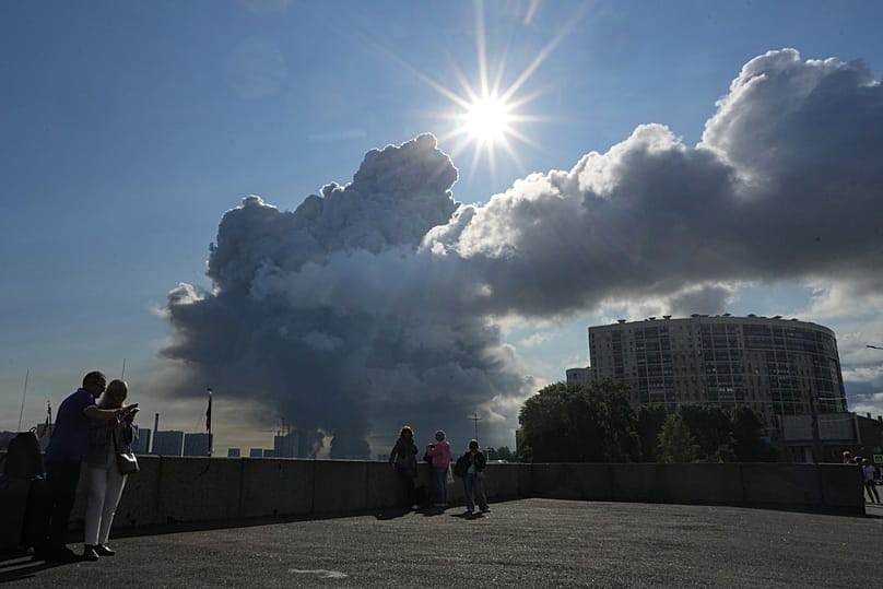 Smoke billows into the sky following Ukrainian drone strikes on warehouses of Russia's online retailer Wildberries, St. Petersburg, July 24, 2026.
