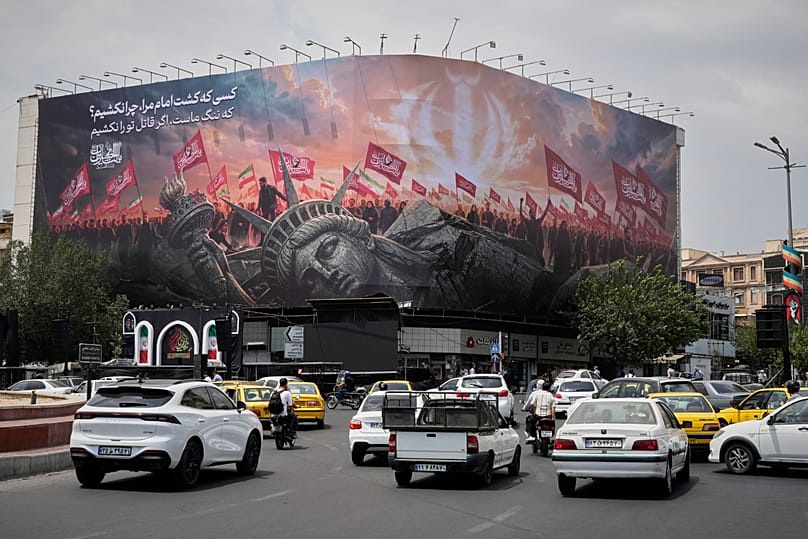 A billboard depicting a fallen Statue of Liberty in Tehran, 3 August, 2026