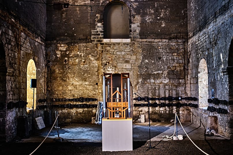 The organ of the John Cage Organ Project Halberstadt is illuminated prior to a chord change inside the medieval Burchardi Church in Halberstadt, Germany - 5 August 2026