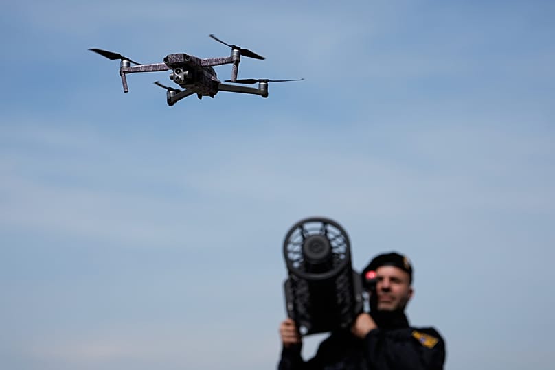 A police officer poses after the opening ceremony of a centre for drone expertise and defence in Erding near Munich on Monday, 4 May 2026.