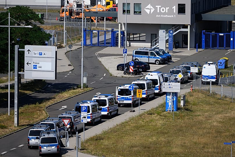 Police vehicles are parked at Leipzig/Halle Airport, 6 August, 2026