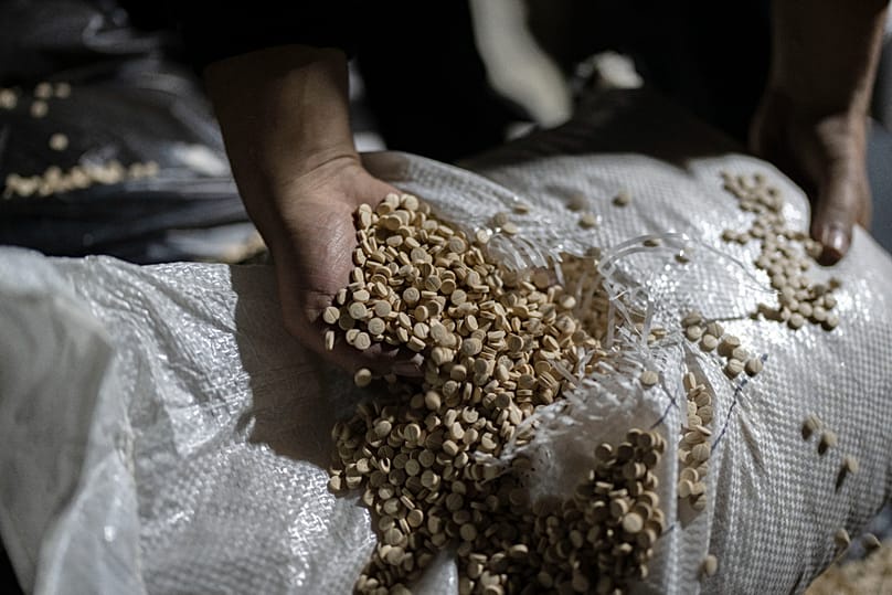FILE: Syrian forces inspect captagon pills inside a military facility where they were made before the fall of the al-Assad regime on the outskirts of Damascus, 7 January 2025