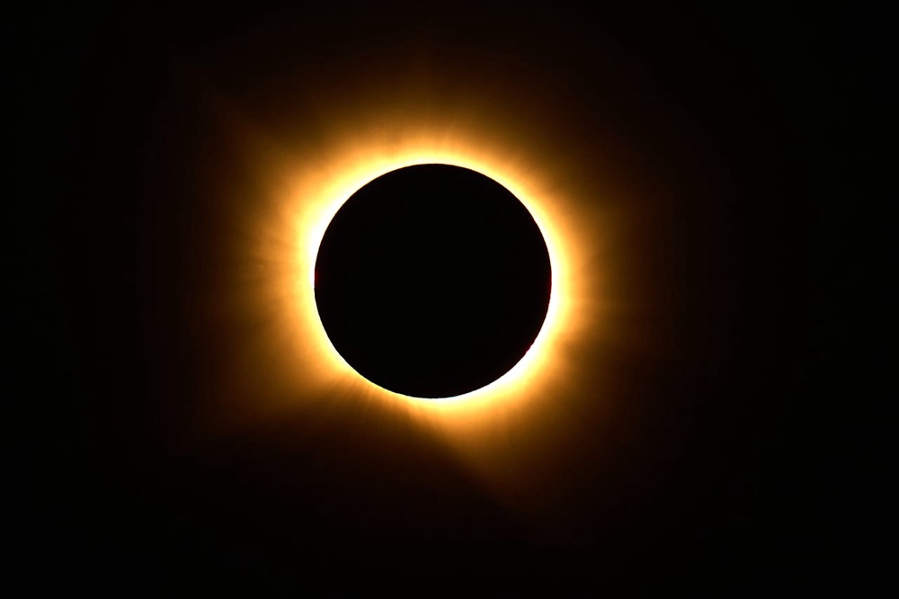 The moon covers the sun during a total solar eclipse in Palencia, Spain
