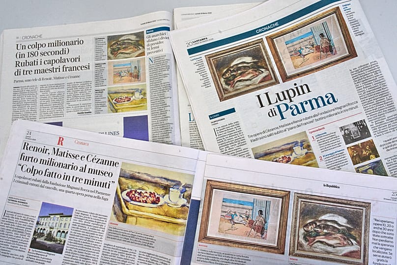 Italian newspapers carry the news of the heist of three paintings from a museum near Parma, 30 March, 2026
