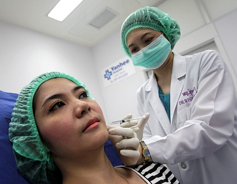 A woman gets a Botox injection at Bangkok’s Yanhee Hospital, 17 October, 2012