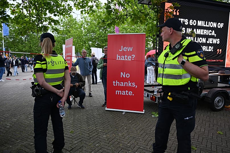 Police patrol near a banner outside of a venue in Arnhem, Netherlands, where West was performing - Saturday 6 June 2026