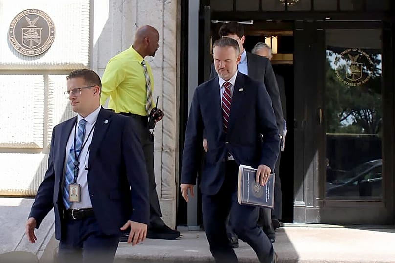 US Trade Representative Jamieson Greer leaves the US Department of Commerce following a meeting with Canadian officials, in Washington, Monday, Aug. 17, 2026