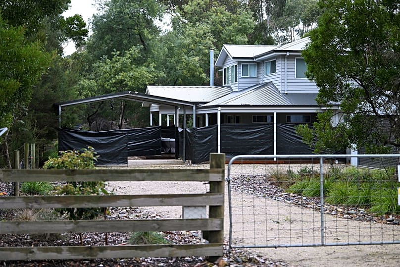 Black plastic surrounds the exterior of the Leongatha home, 1 July, 2025