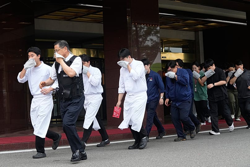 Staff members of a hotel take part in an anti-terror drill as part of a military exercise between the US and South Korea in Seoul, South Korea, Wednesday, Aug. 19, 2026