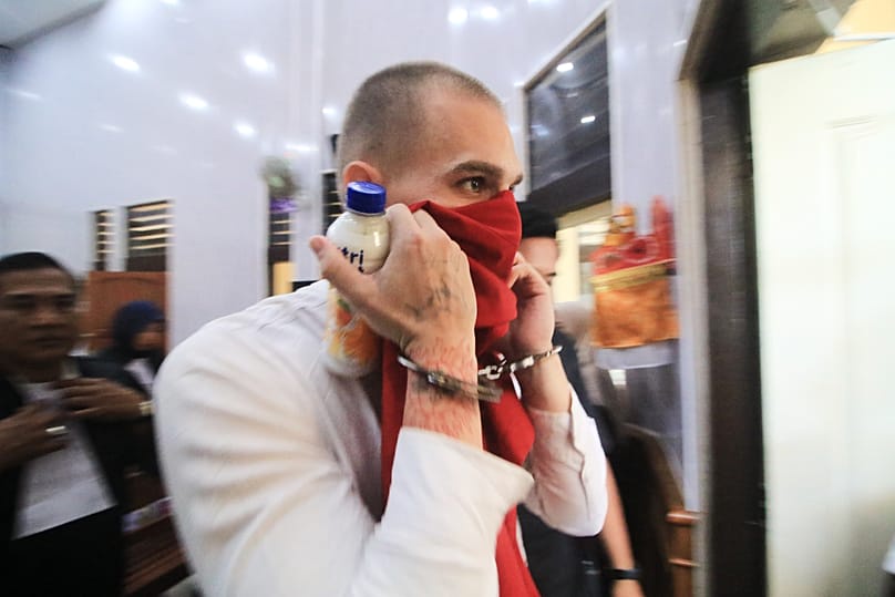 Swiss tourist Luzian Andrin Zgraggen leaves the courtroom after his sentencing hearing at the district court in Denpasar, 20 August, 2026