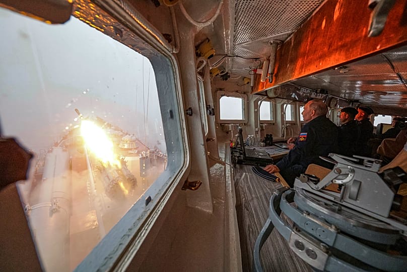 FILE: Russian President Vladimir Putin watches a military exercise from the bridge of the Varyag missile cruiser of the Pacific Fleet near Sakhalin Island, 12 August 2026