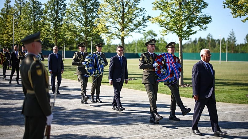 European Council President António Costa at the front of a wreath-laying delegation in Hatne, southwest of Kyiv, Ukraine, 24 August, 2026.