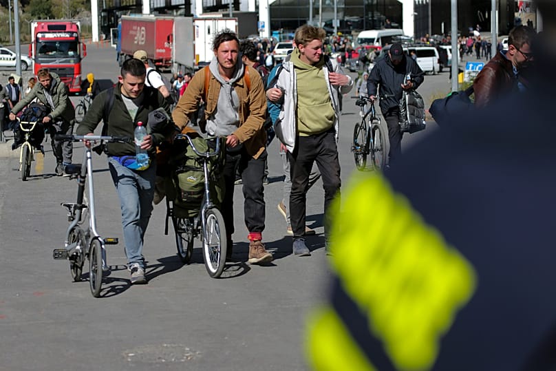 A group of Russians after crossing the border through the Verkhny Lars checkpoint between Russia and Georgia, 27 September 2022.