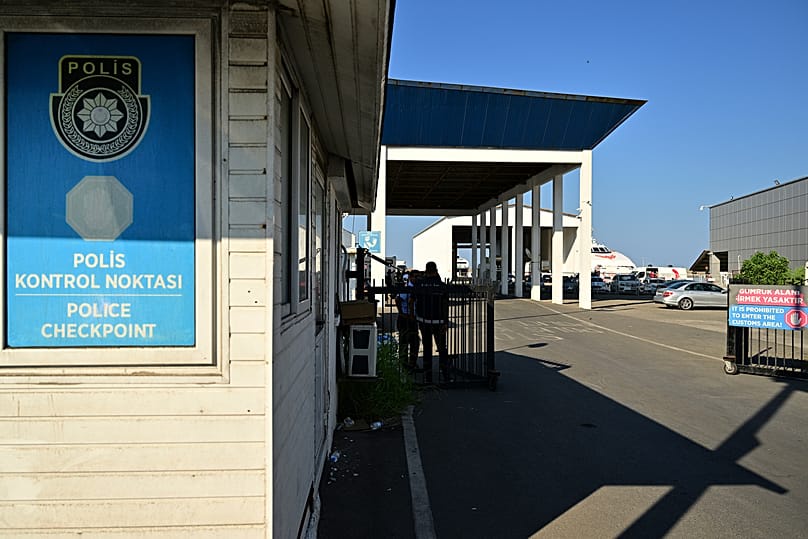 Police officers guard the entrance to the port of Kyrenia in the Turkish-occupied northern part of Cyprus, 30 August, 2026