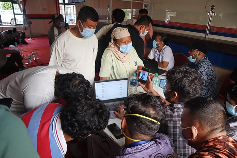 People inquire about the bodies of their relatives killed in flash floods at a mortuary in Chitwan, Nepal, Saturday, 29 August, 2026