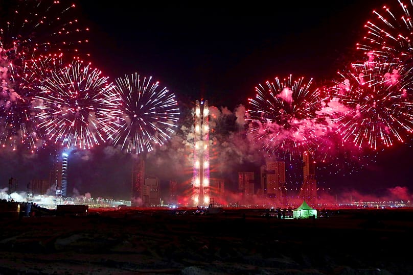 Fireworks light up the Chinese-built Iconic Tower in Egypt's New Administrative Capital during New Year celebrations.