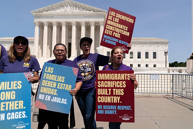 Activists celebrate the Supreme Court's birthright citizenship ruling outside of the Supreme Court on Capitol Hill, Tuesday, June 30, 2026, in Washington