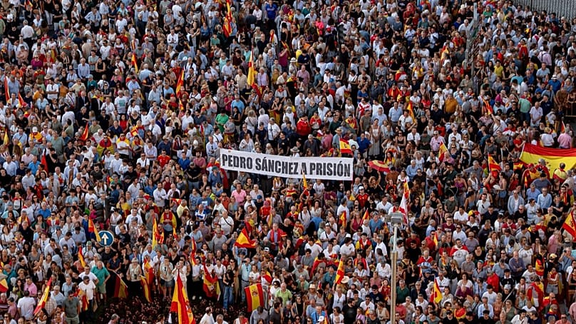Protestors accuse Sánchez of abandoning the residents of Ceuta after 70,000 migrants crossed into the enclave in July.