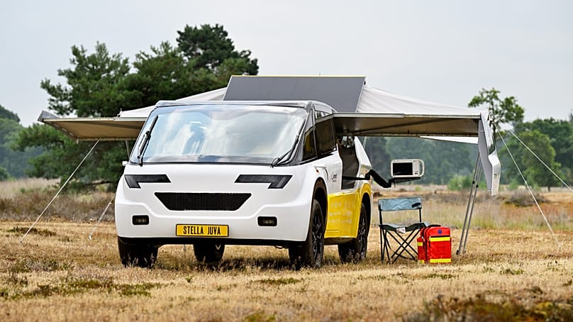 Stella Juva parked up with its solar panels extended.