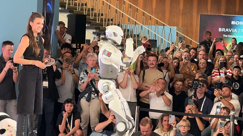 Humanoid robots and robotic pets came together on the runway to show their skills.