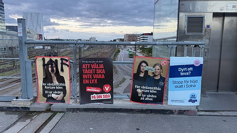 Election posters of Swedish poitical parties with two of them from Social Democrats shows their healthcare slogans, Solna, Sweden (9 September, 2026)