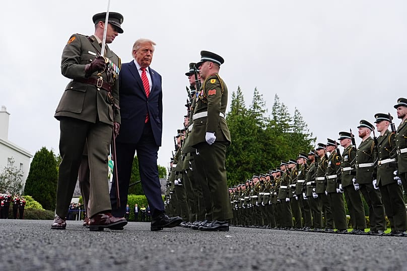 Donald Trump during a review of soldiers from the Guard of Honor during a visit with Irish President Catherine Connolly at Áras an Uachtaráin, Saturday, Sept. 12, 2026
