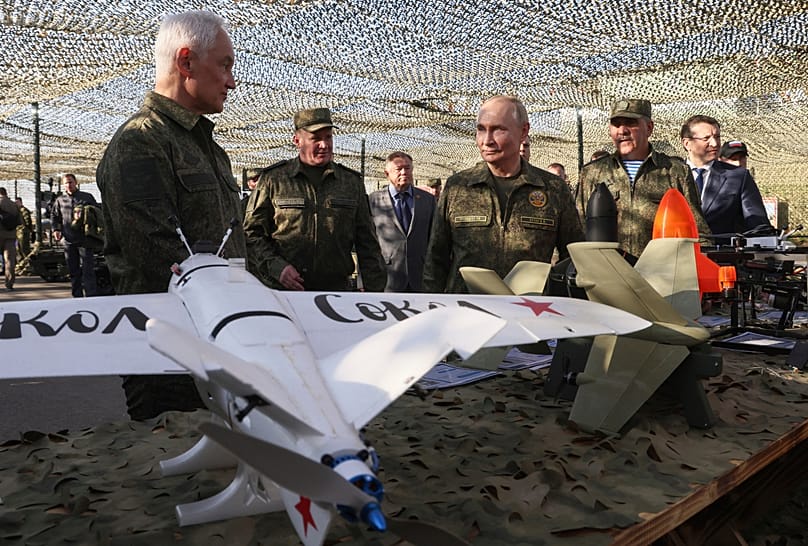 Vladimir Putin inspects Russian weapons and equipment at the Russian-Belarusian joint military drills 