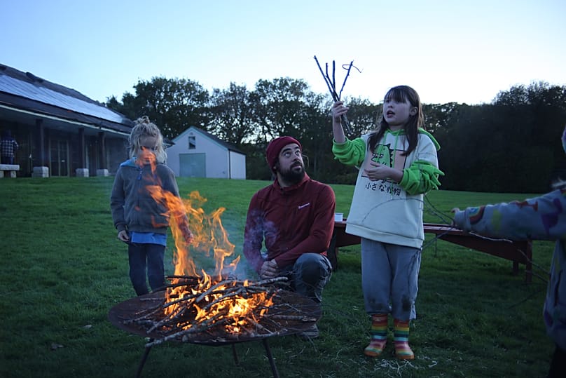 Bushcraft Bus teaches skills like fire safety and foraging.