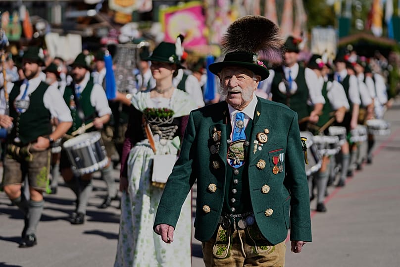 People in traditional Bavarian dress during the Oktoberfest parade at the 191st Oktoberfest in Munich, Germany, on Saturday, 19 September 2026.