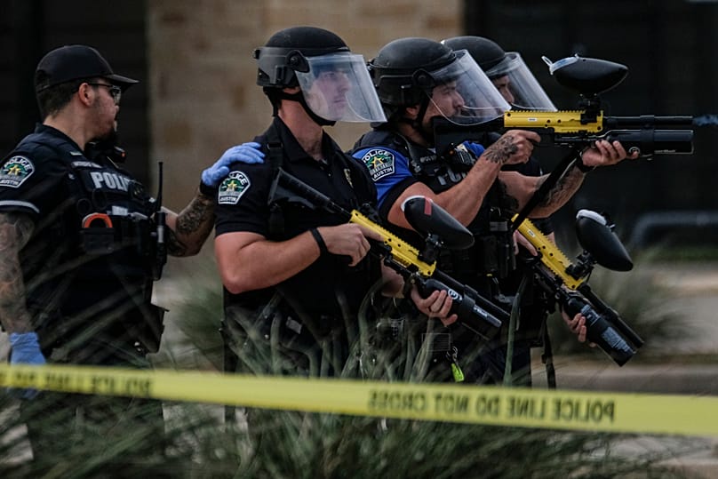 Authorities deploy non-lethal weapons near a demonstration where a man was shot in his vehicle by an ICE officer in Austin, 20 September, 2026