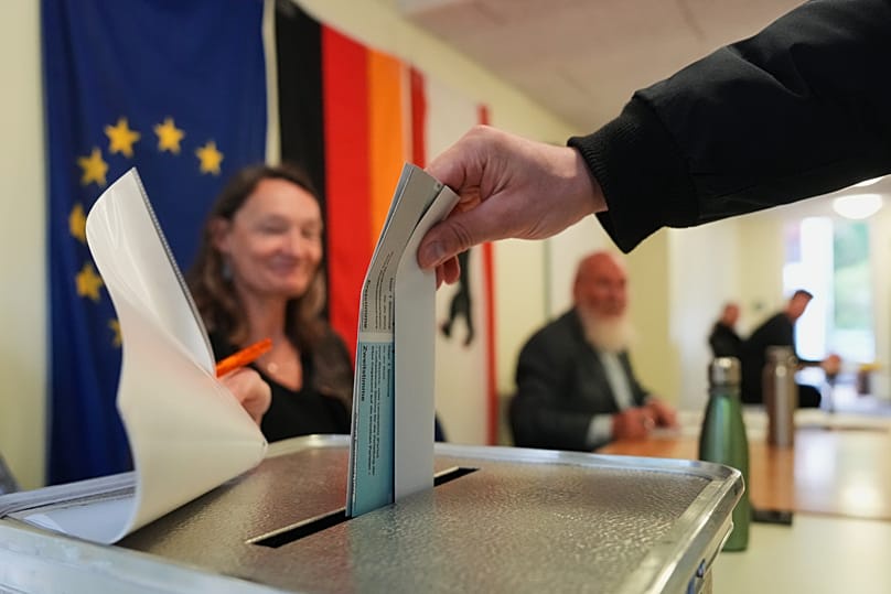 A man casts his ballots for the Berlin state election in Berlin, 20 September, 2026