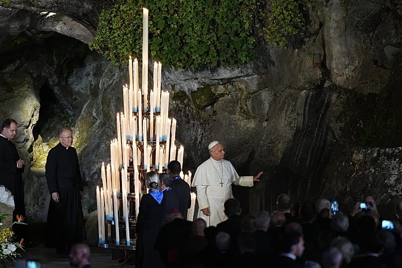 Pope Leo XIV prays at the Grotto of the Apparitions of Massabielle, in Lourdes, France, Saturday, Sept. 26, 2026. 