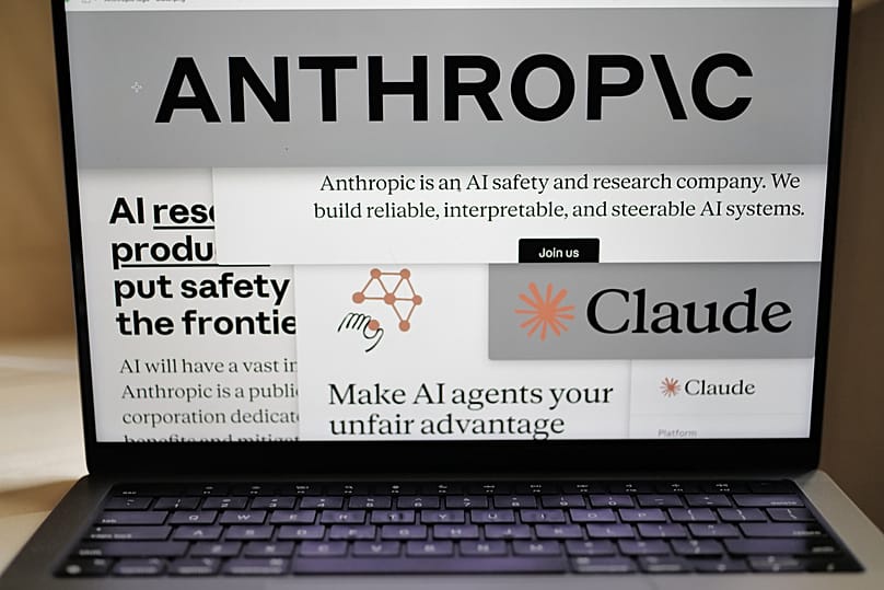 FILE - Pages from the Anthropic website and the company's logos are displayed on a computer screen in New York, Feb. 26, 2026