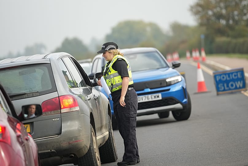 Police officers stand at a checkpoint near RAF Fairford air base in Fairford, 29 September, 2026