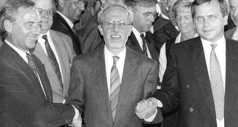 Handshake between Günther Krause (GDR state secretary), Lothar de Maizière (GDR prime minister), Wolfgang Schäuble (Federal Minister of the Interior, FRG)
