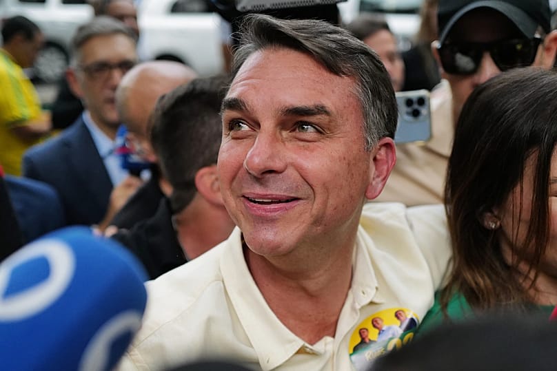 Opposition presidential candidate Sen. Flavio Bolsonaro arrives to vote during general elections in Rio de Janeiro, Sunday, Oct. 4, 2026